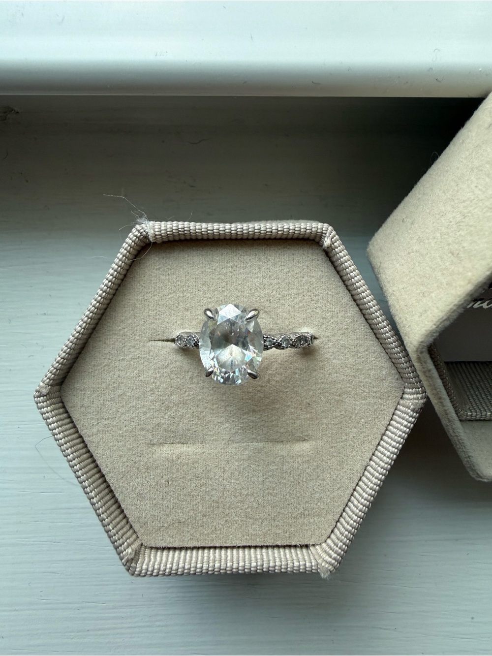 White Crystal Solitaire Ring with Pavé Accented Band
